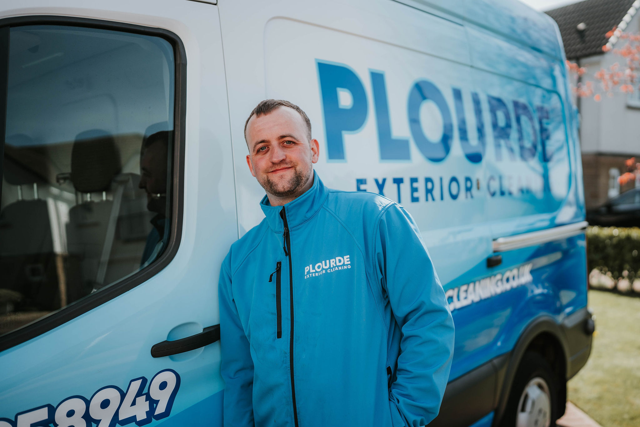 Plourde Exterior Cleaning team member preparing equipment for a professional exterior clean in East Kilbride