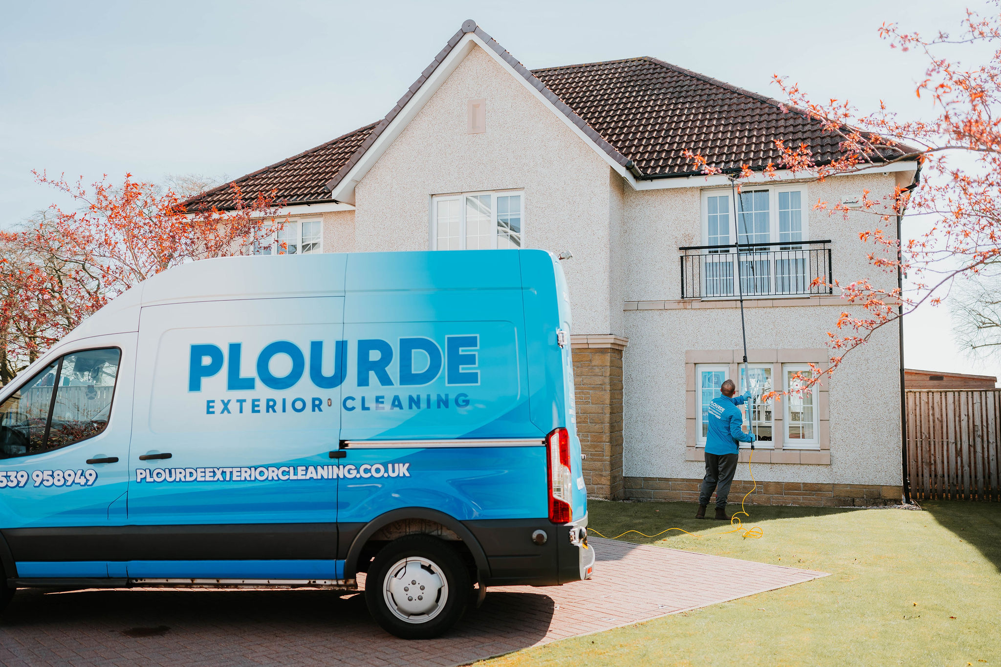 Residential street in East Kilbride showing typical semi-detached houses that Plourde Exterior Cleaning serves