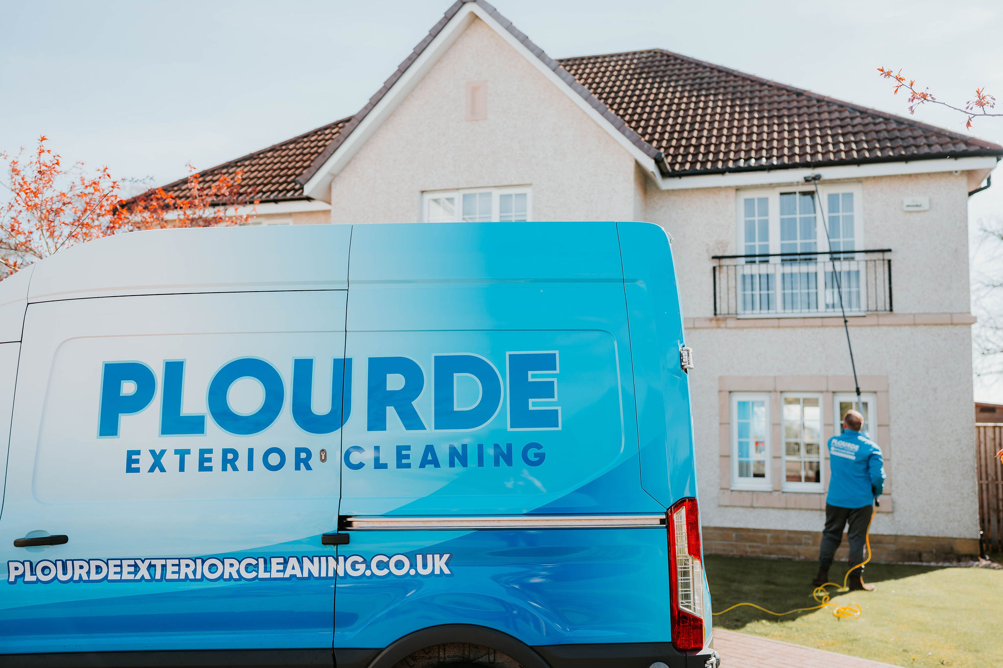 Clean white fascia and soffit boards on a residential property after professional cleaning in East Kilbride