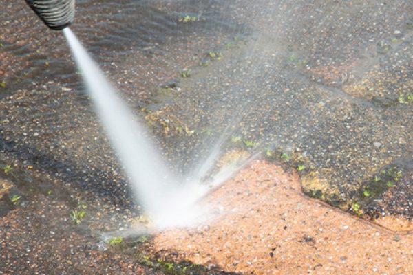 Pressure washing driveway by Ploude Exterior Cleaning in East Kilbride